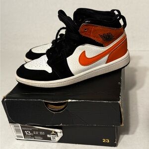 Air Jordan 1 Mid Black White Orange Retro